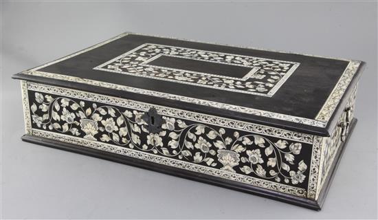 An 18th century Indo Portuguese ebony and ivory casket, width 1ft 7.5in. depth 1ft 1.5in. height 4.5in.